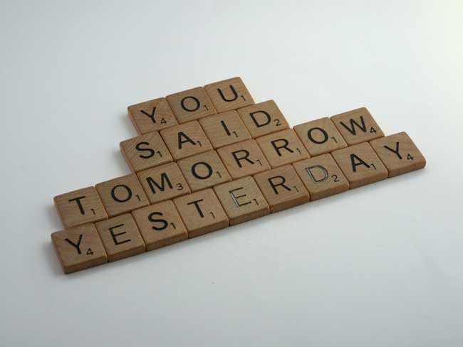 Scrabble tiles that say You Said Tomorrow Yesterday